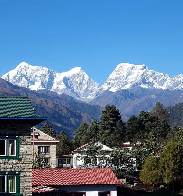 A guest house and the view of Numbur Himal from Phaplu