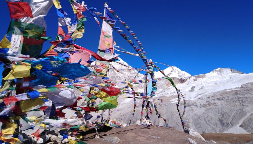 Prayers flags on Tsergo Ri Peak in Langtang